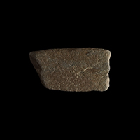 Fragment of ground stone tool